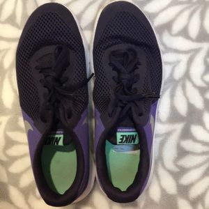 Purple Nike tennis shoes